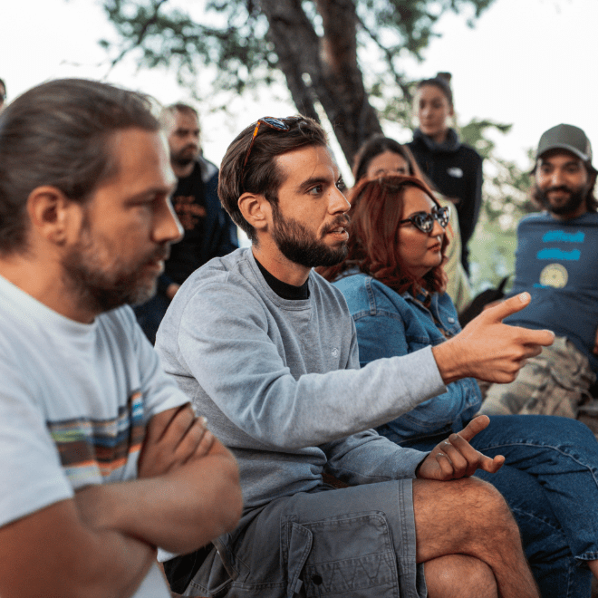 Baresquare employees discussing during offsite